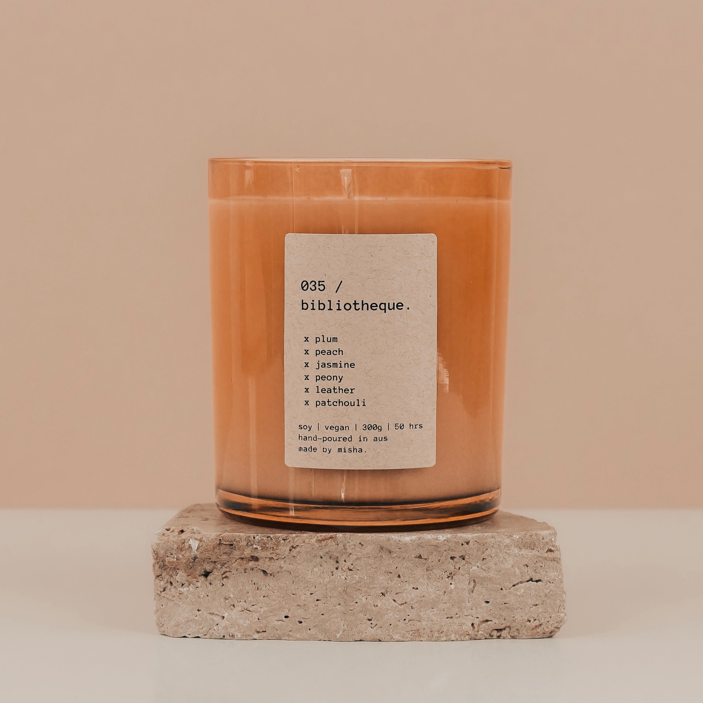 035 / bibliotheque. (plum, peach, jasmine, peony, leather, patchouli)