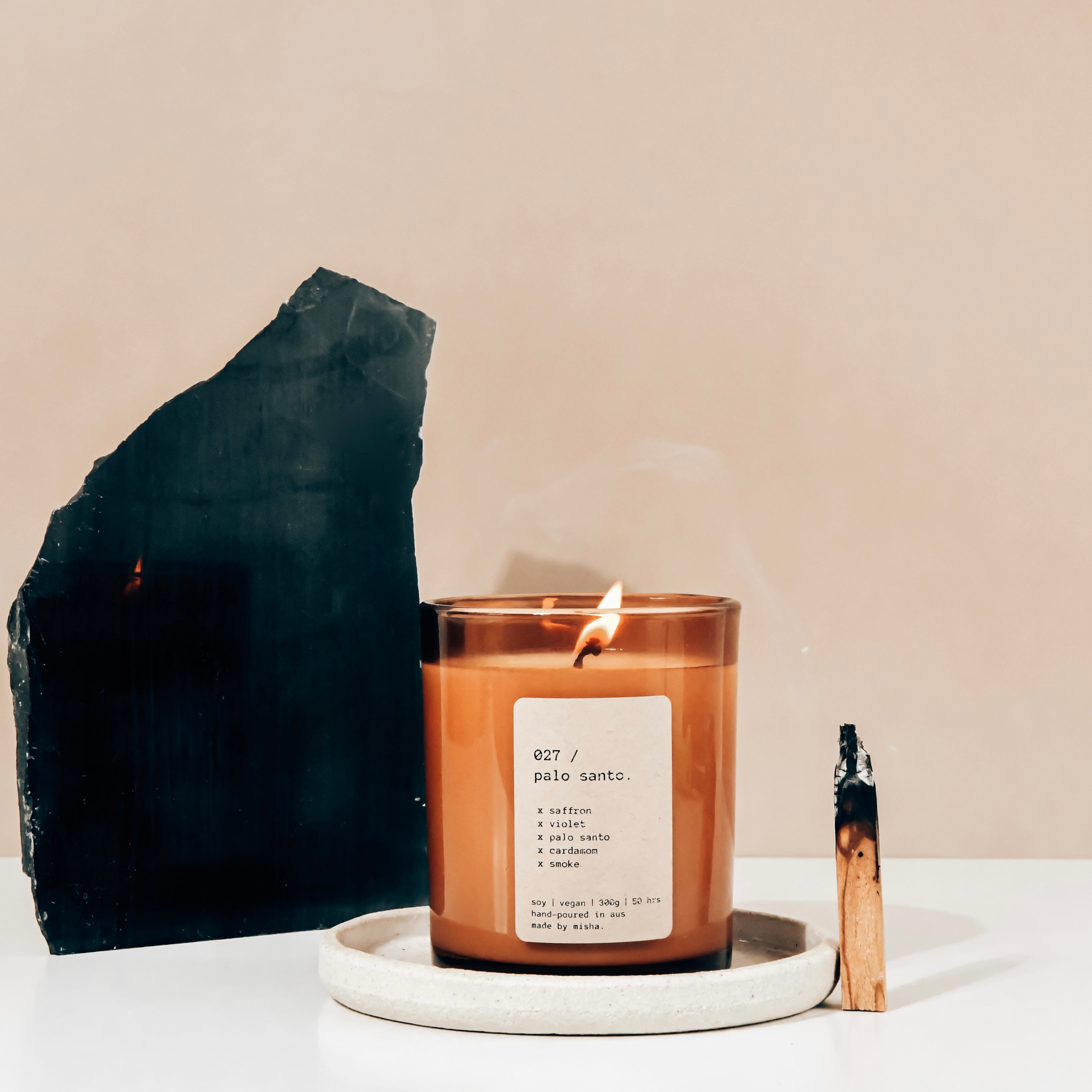 027 / palo santo. (saffron, violet, palo santo, cardamom, smoke)