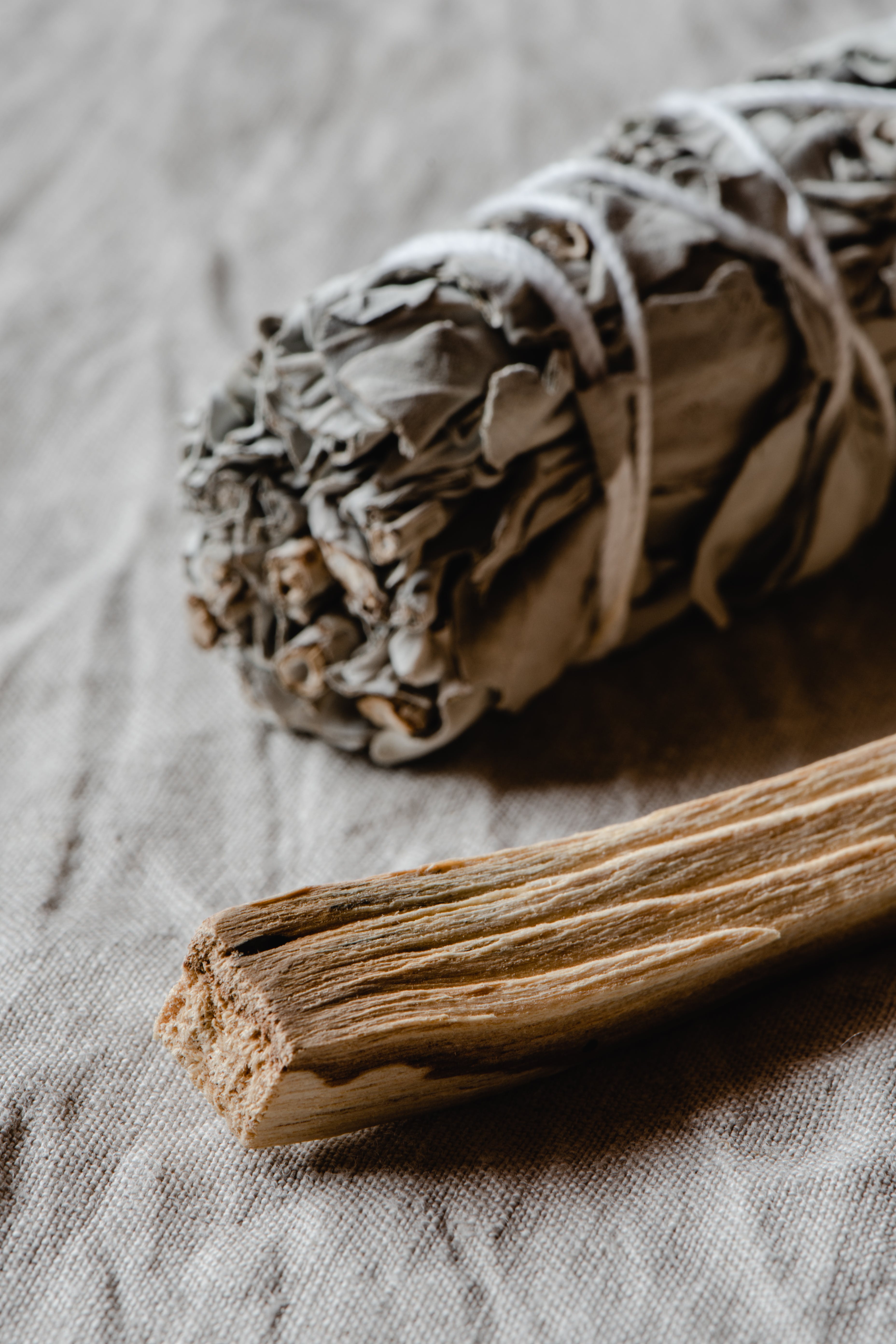 smudging and cleansing items. palo santo, incense, sage.